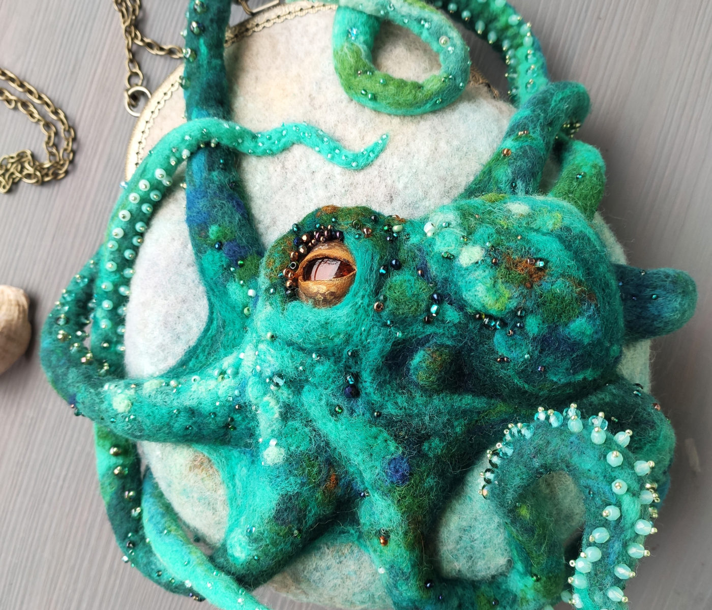 Turquoise octopus felt bag with bead embroidery