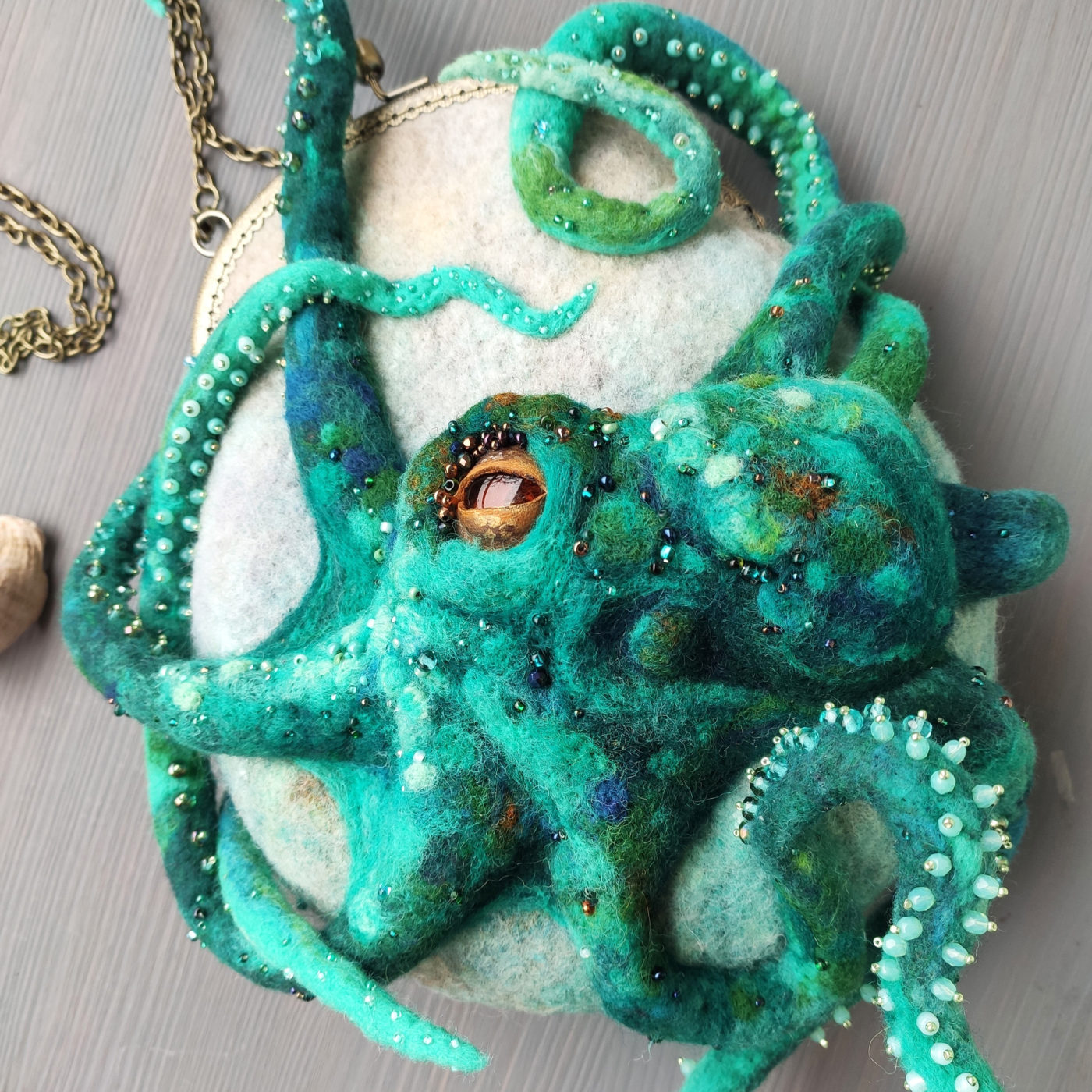 Turquoise octopus felt bag with bead embroidery