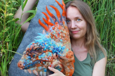 I am with my iguana grey felt backpack