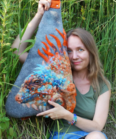 I am with my iguana grey felt backpack