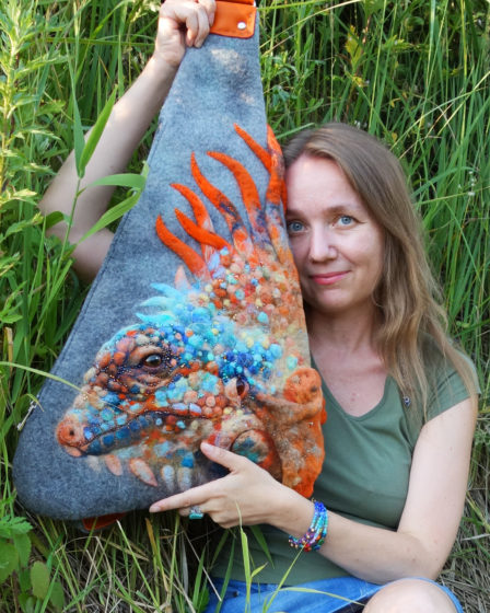 I am with my iguana grey felt backpack